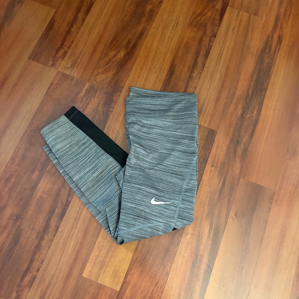Nike Women’s ' Heather Gray Athletic Leggings- Black mesh feature on lower legs